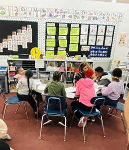 BHS Student sitting with Davis students