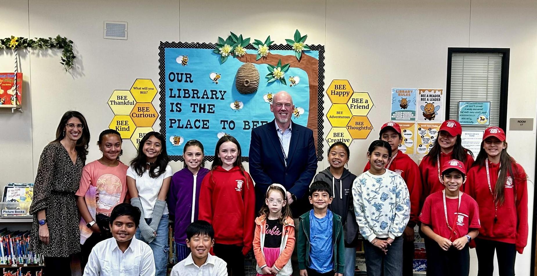 PUSD Superintendent, Principal and students in the library at Morning Creek Elementary School