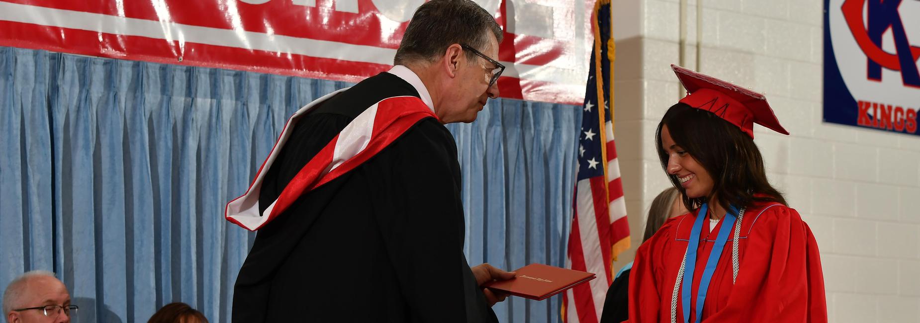 Student getting her diploma