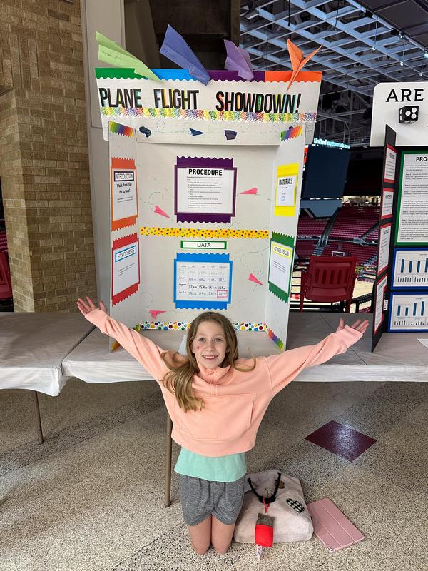 Oak Ridge student with their project at the regional science fair