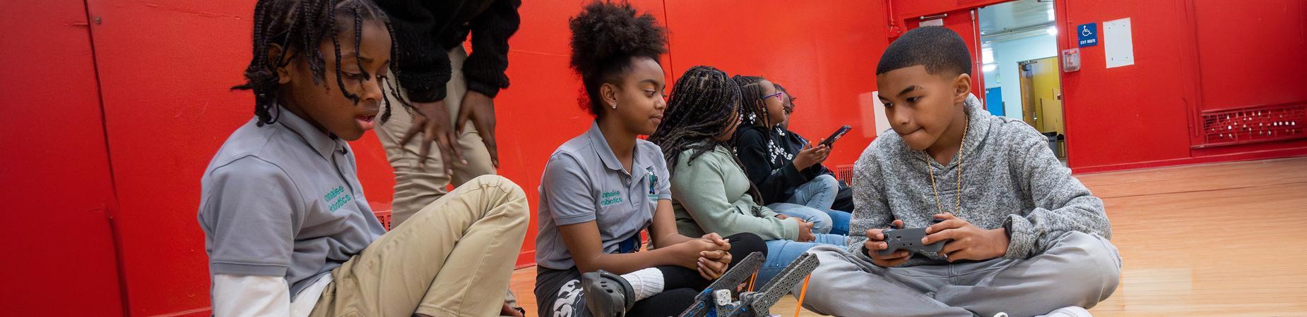 African American students in robotics class
