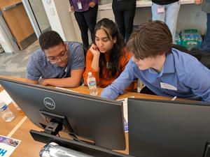 students working at a computer