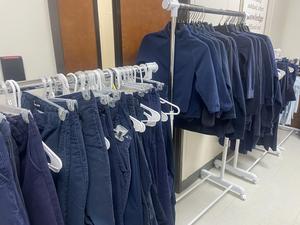 Clothes in closet.