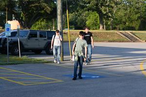 Students getting dropped off for school.