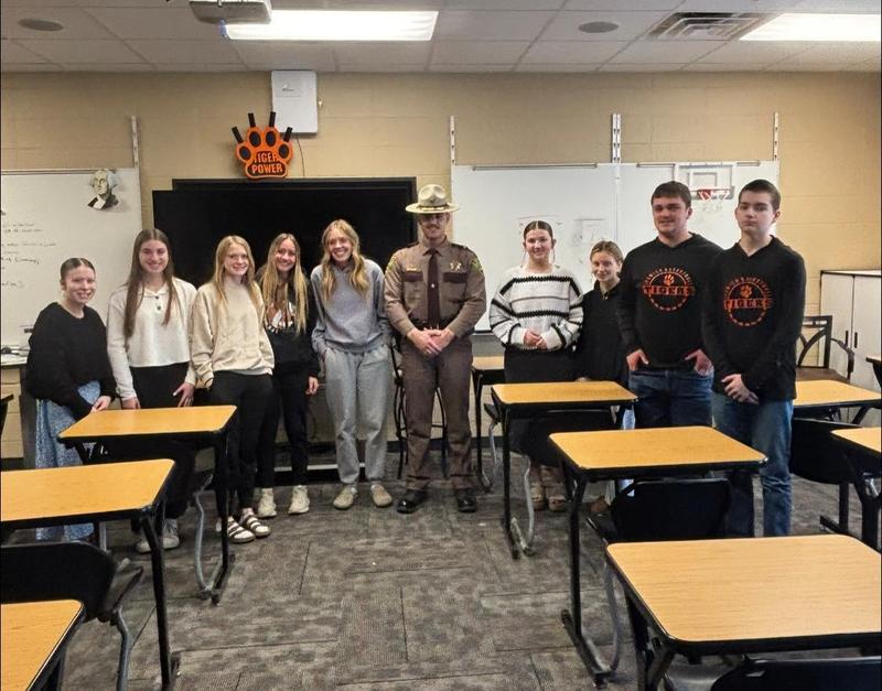 Carson Gohl speaks to the careers class about the reponsibilities of a SD Highway Officer