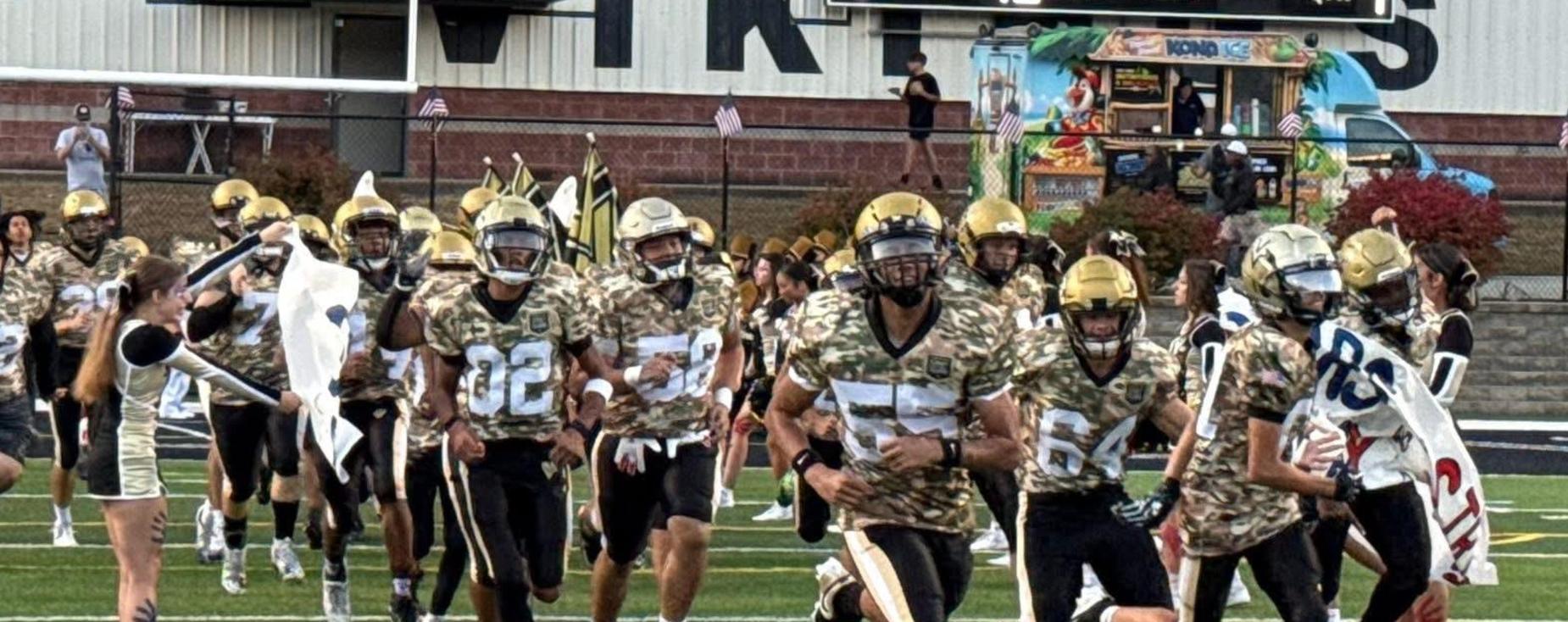 2026 Valley Football team taking the field