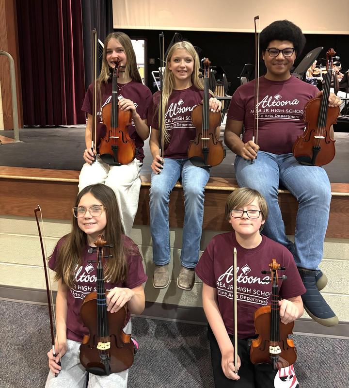 Group phot of students who are in the concert.