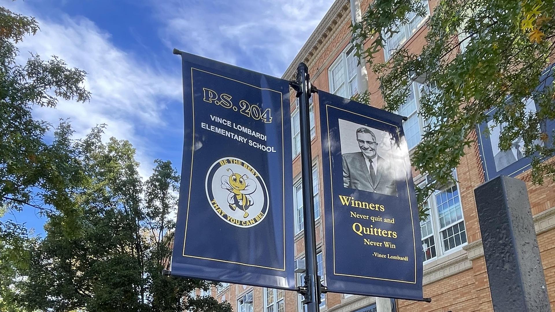 PS 204 outdoor view with banners.