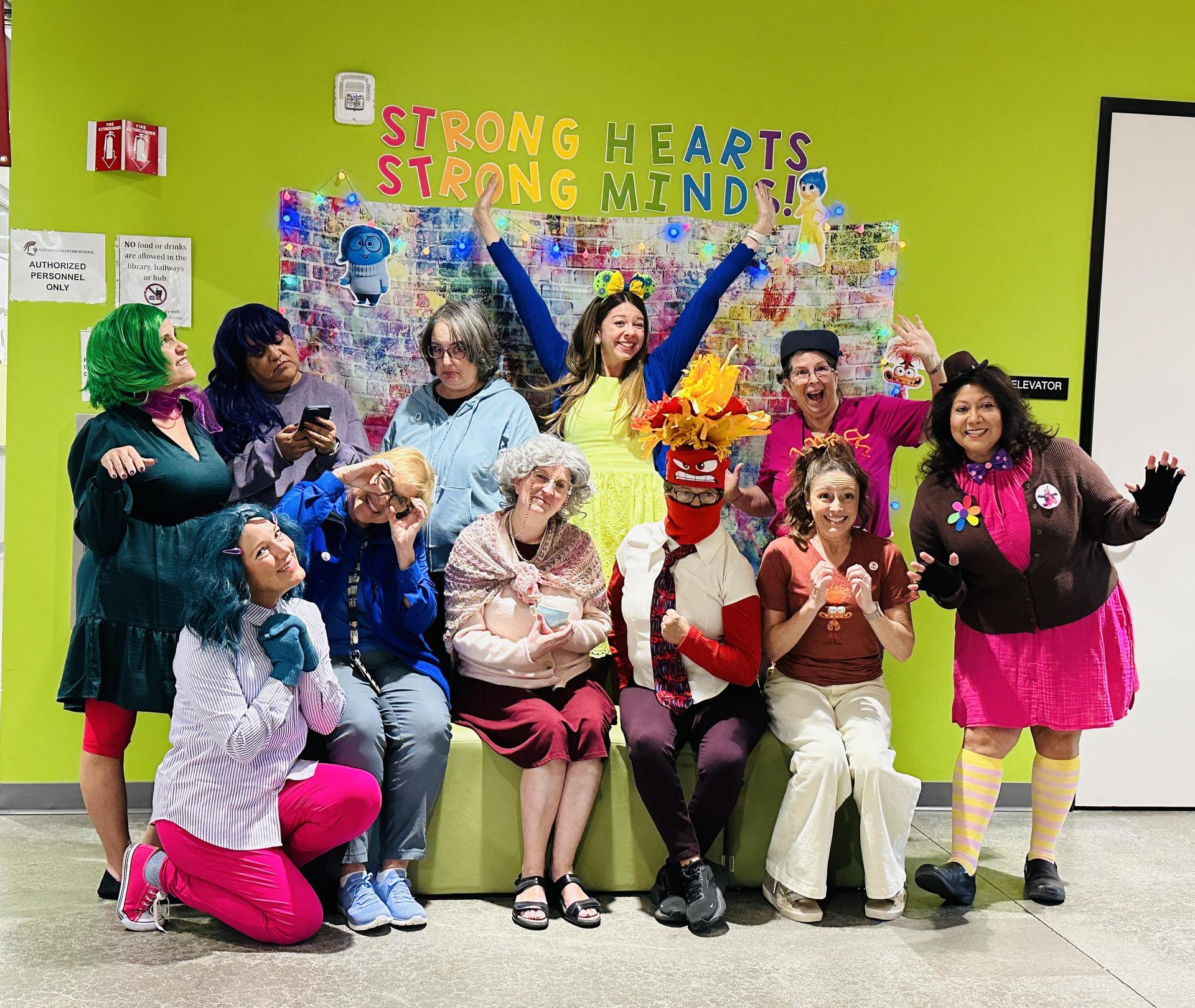 PACT staff members dressed as characters from Inside Out