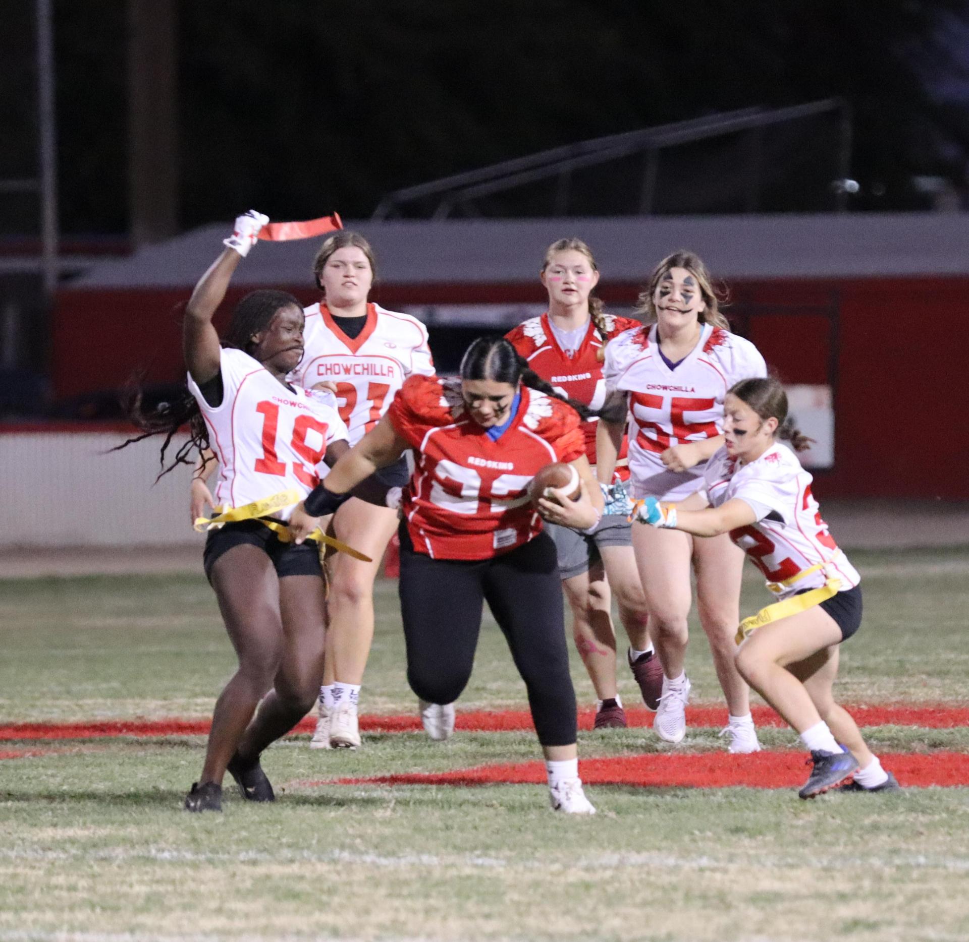 girls playing flag football