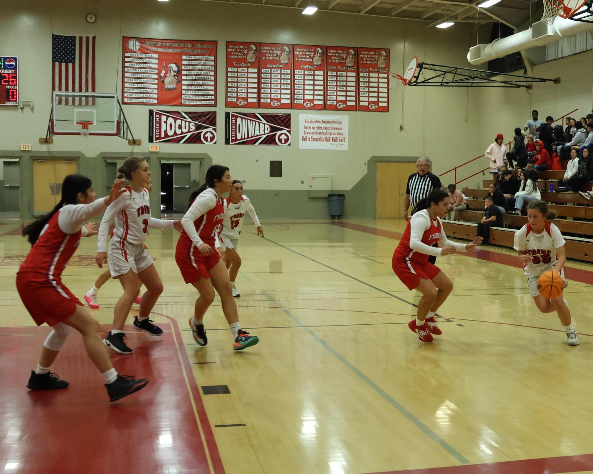 Varsity Girls Basketball playing against Firebaugh