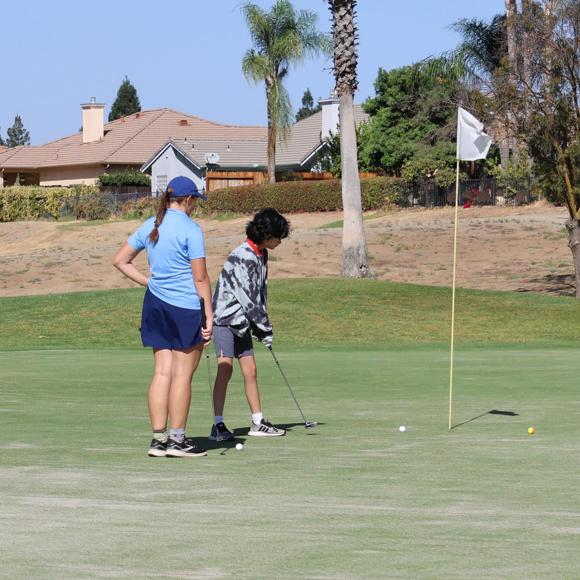 Girls golfers in action at the championships