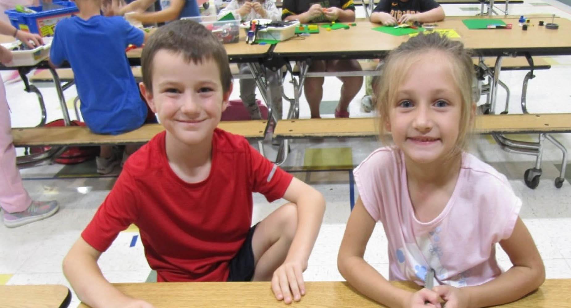 Harrison Park 1st-graders Calvin Snyder and Aviana Leith build with Legos