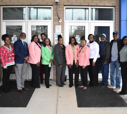 A group consisting of CCSS Administrators and alpha kapp sorority