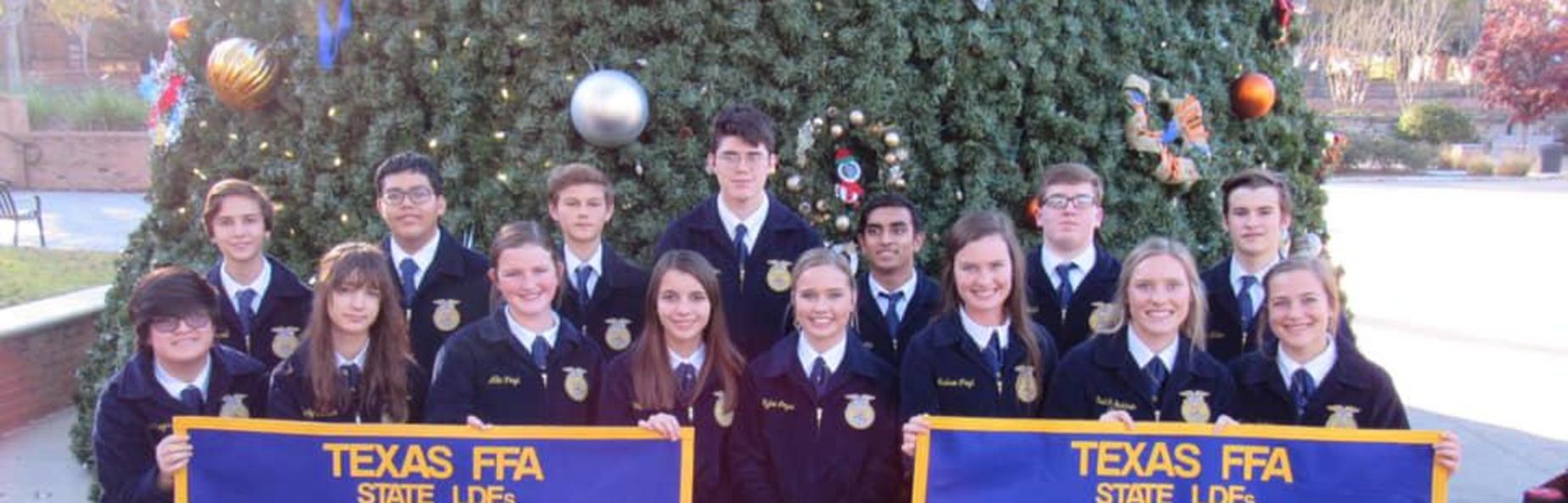 FFA students holding banners