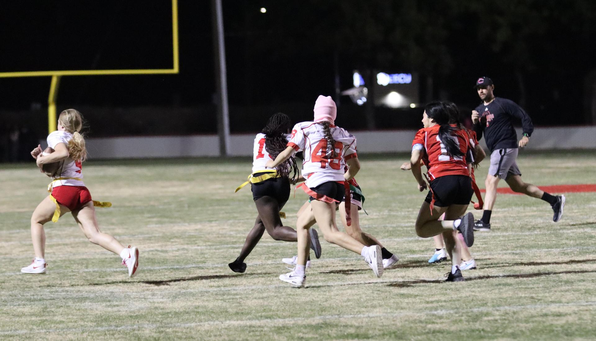 girls playing flag football