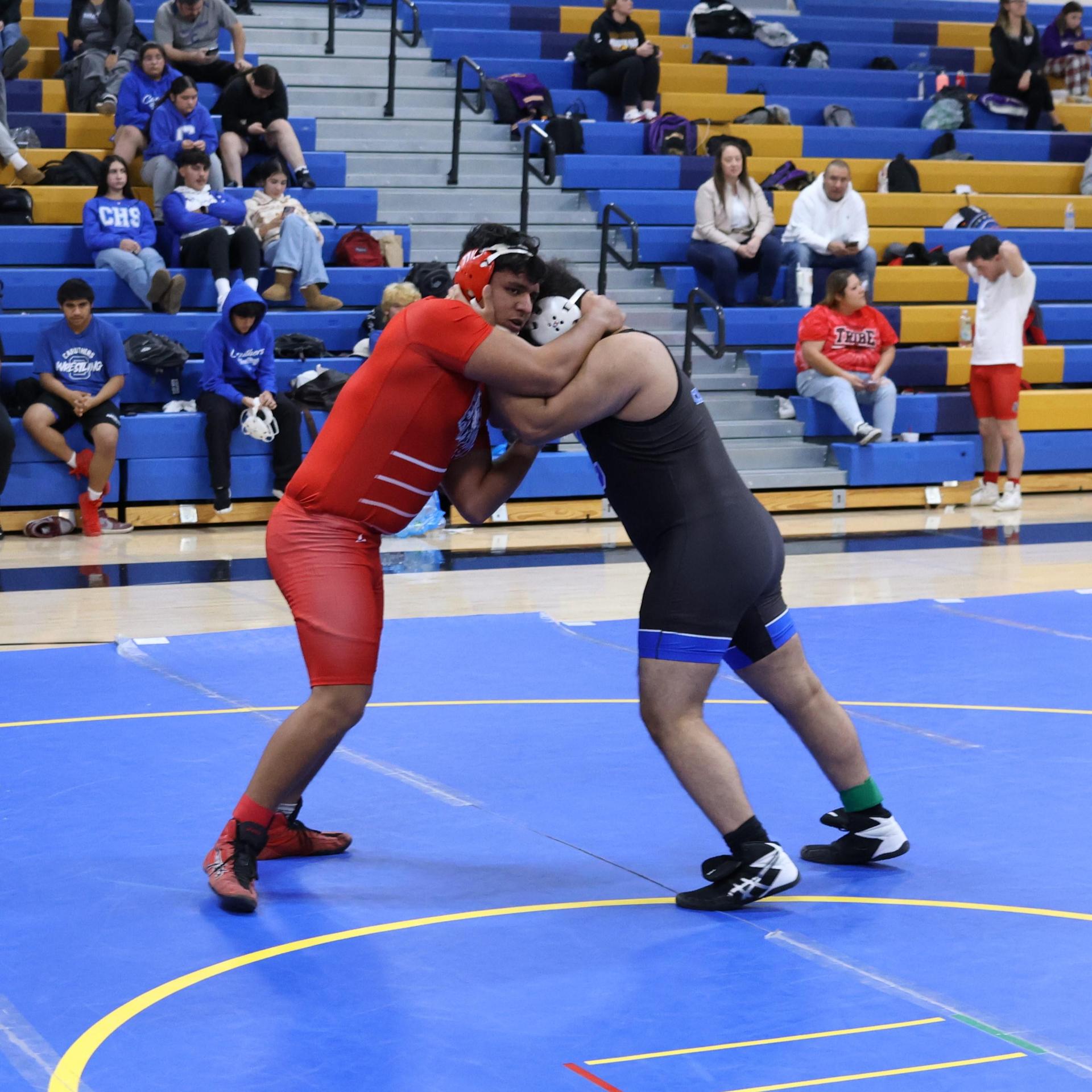 wrestlers in action at parlier