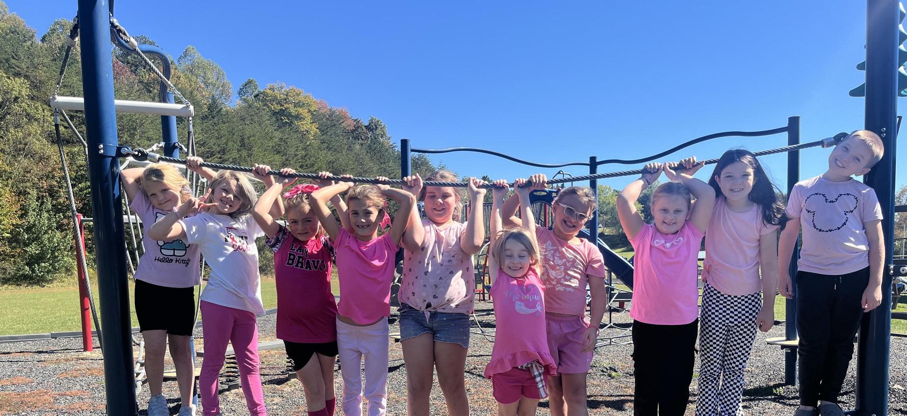 CES students celebrate Pink Out on the playground