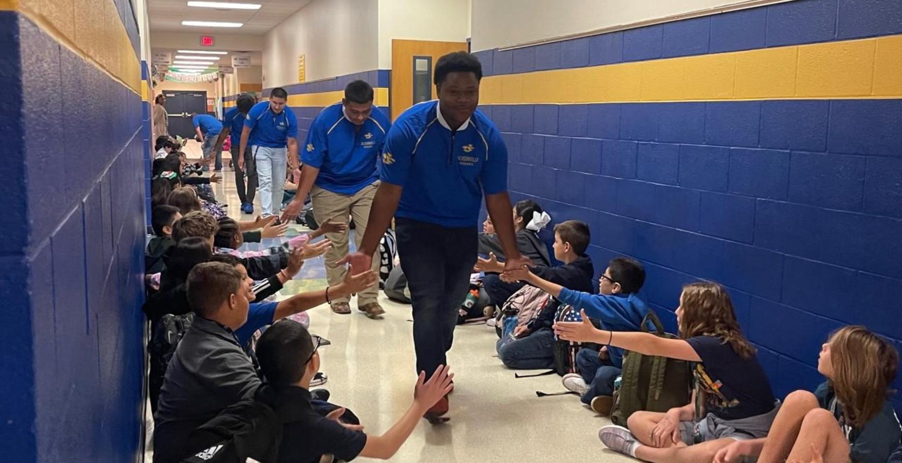 Football players visit Nichols