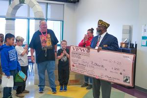 VFW Post 1820 Senior Vice Commander Steven Porter recognizes Gary Rutkowski