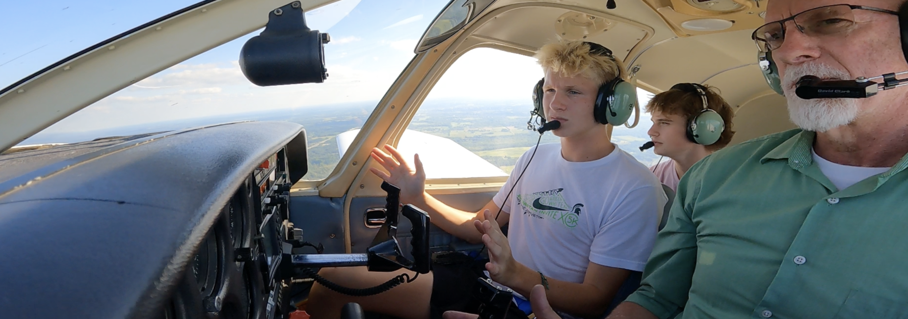 students and teachers flying
