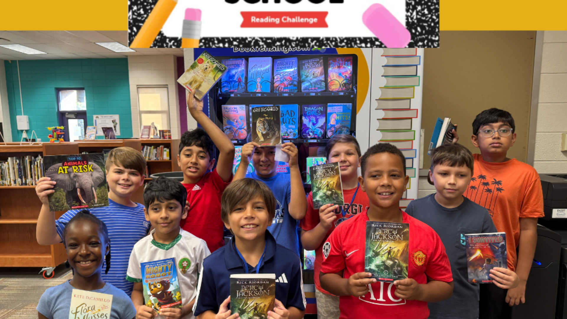 A group of children in a library, holding books and participating in a reading challenge.