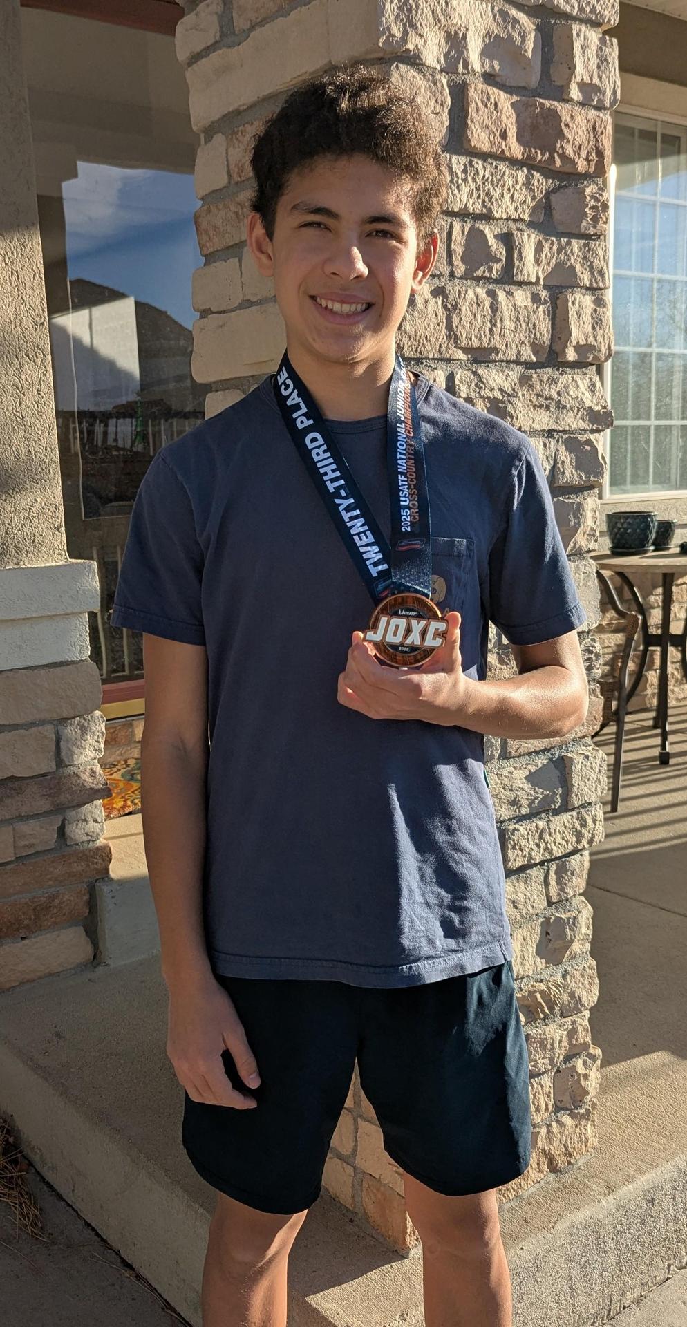 Teo with All American medal