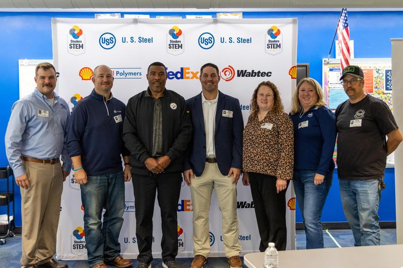 Visitors from the Steelers and US Steel pose for a photo