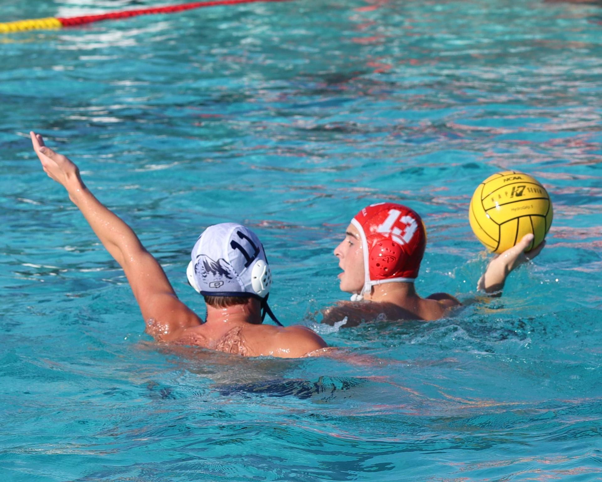 Boys playing water polo against Yosemite
