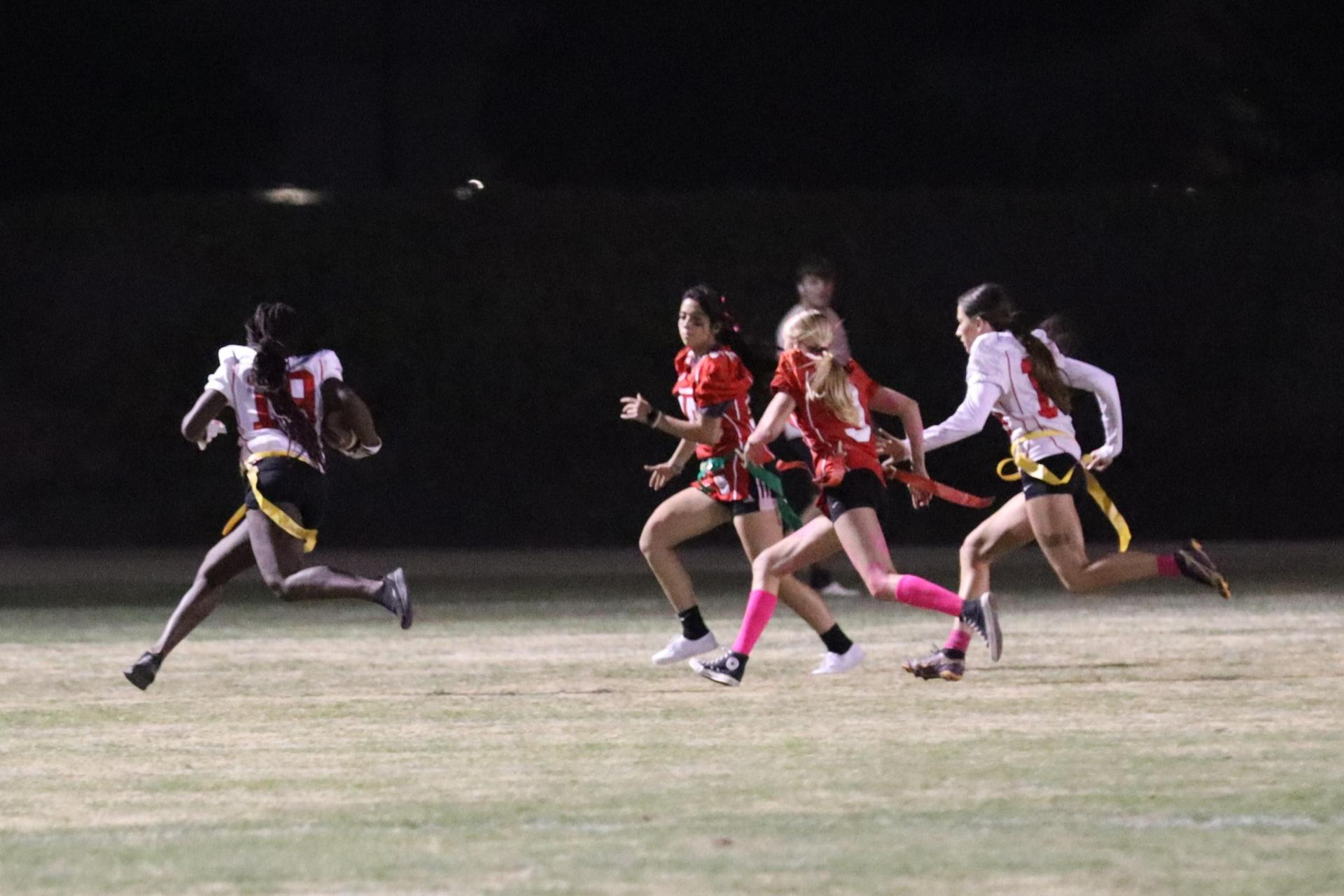 girls playing flag football