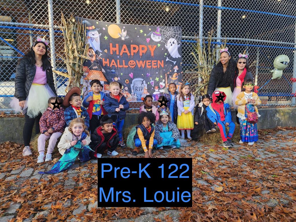 staff and students in halloween costumes