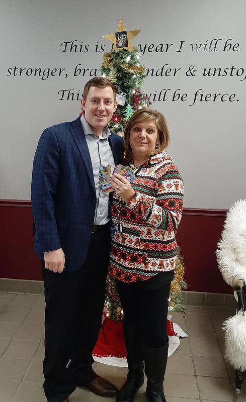 Mike Fleming presents Luann Murtha with a donation from Aflac.