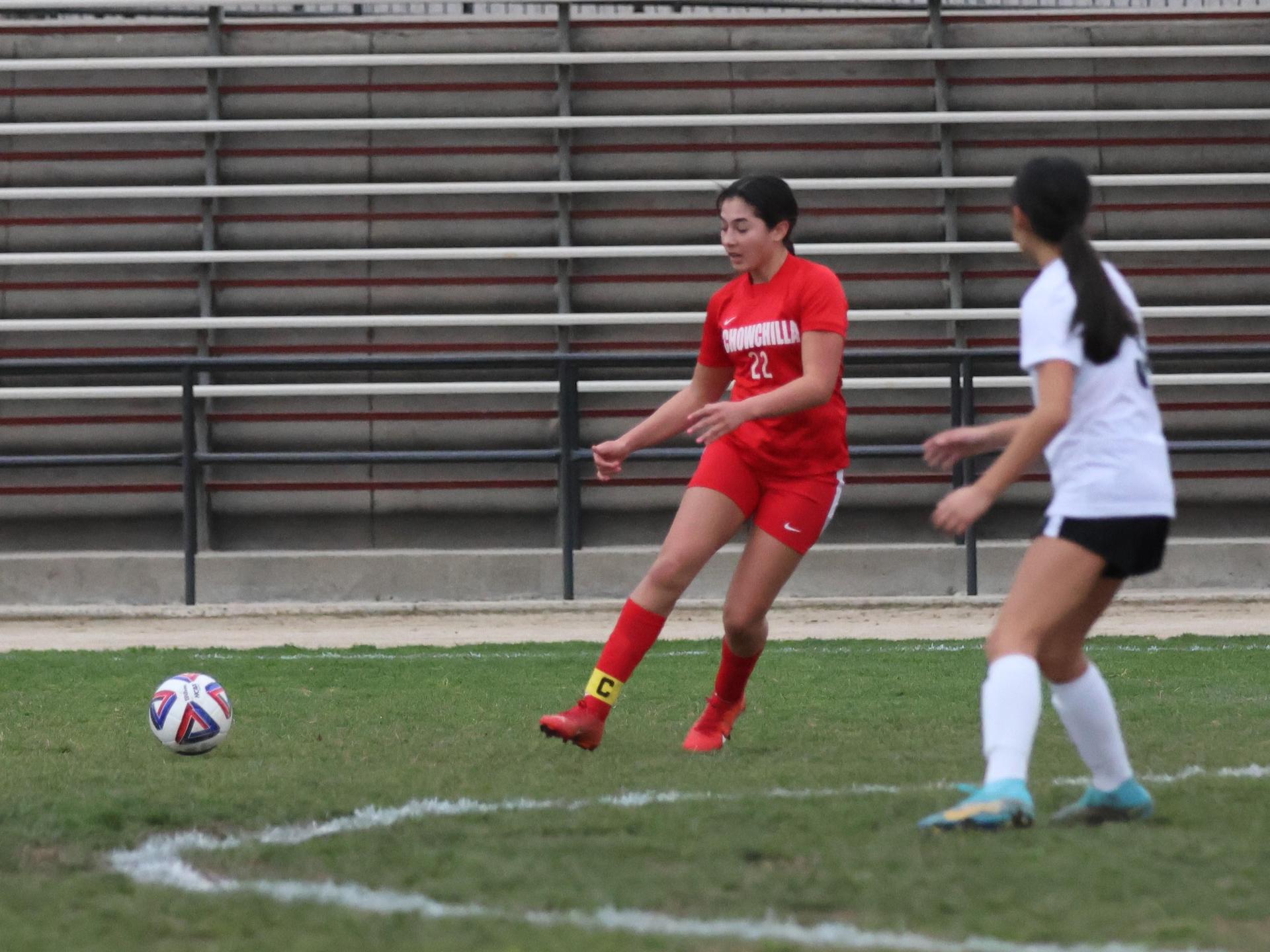 Junior varsity girls playing soccer against liberty