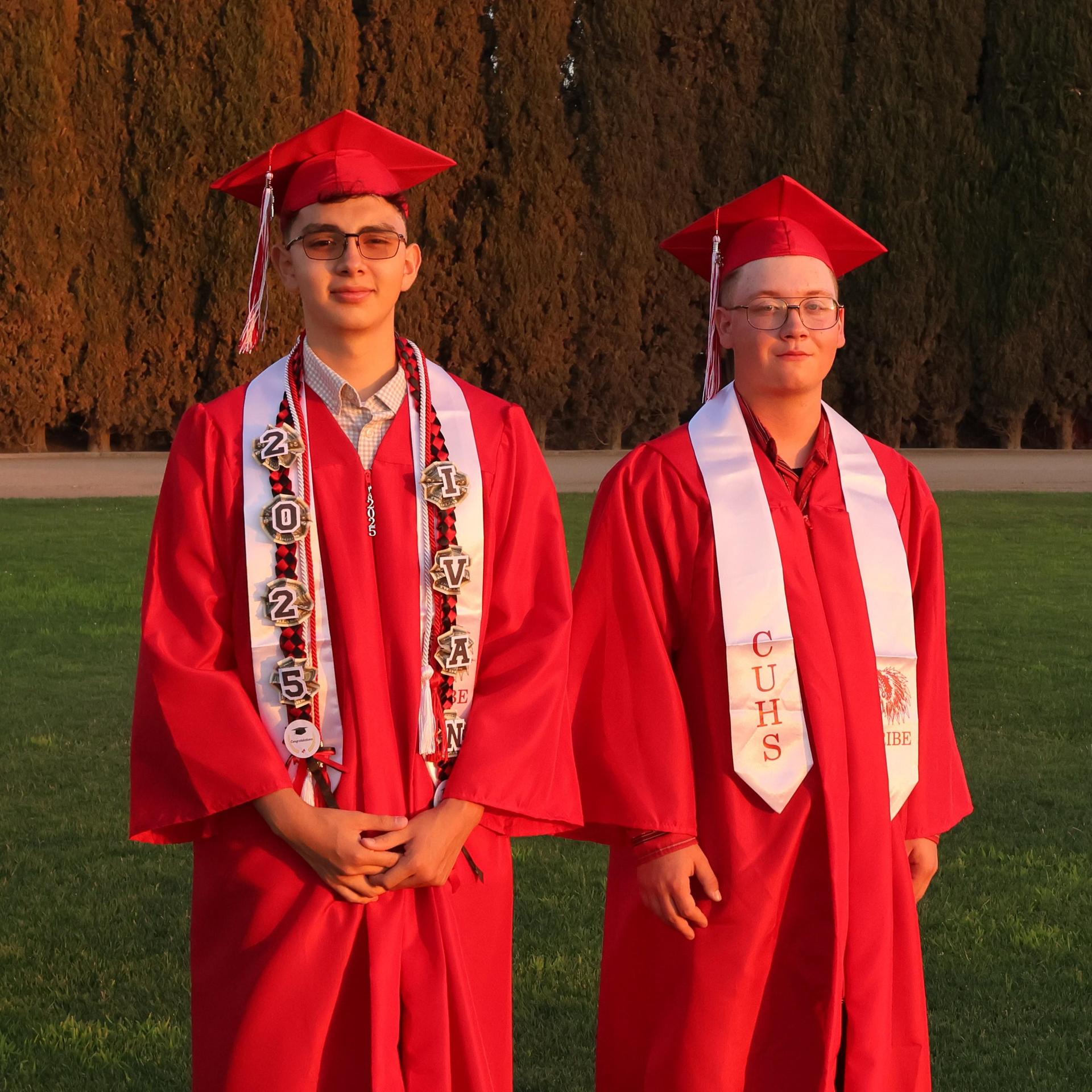 seniors posing together before walking in to graduation