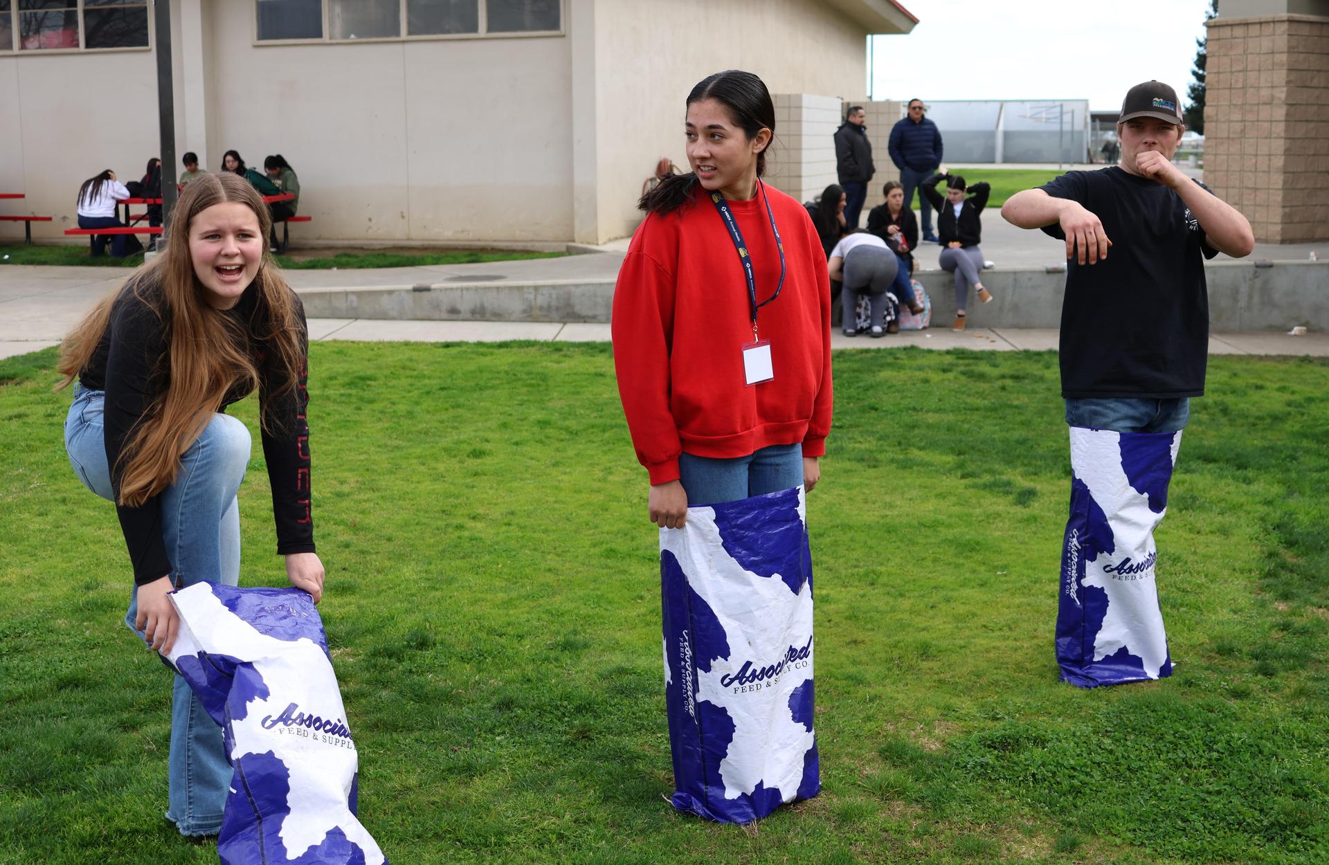 students and staff enjoying the feed bag relay
