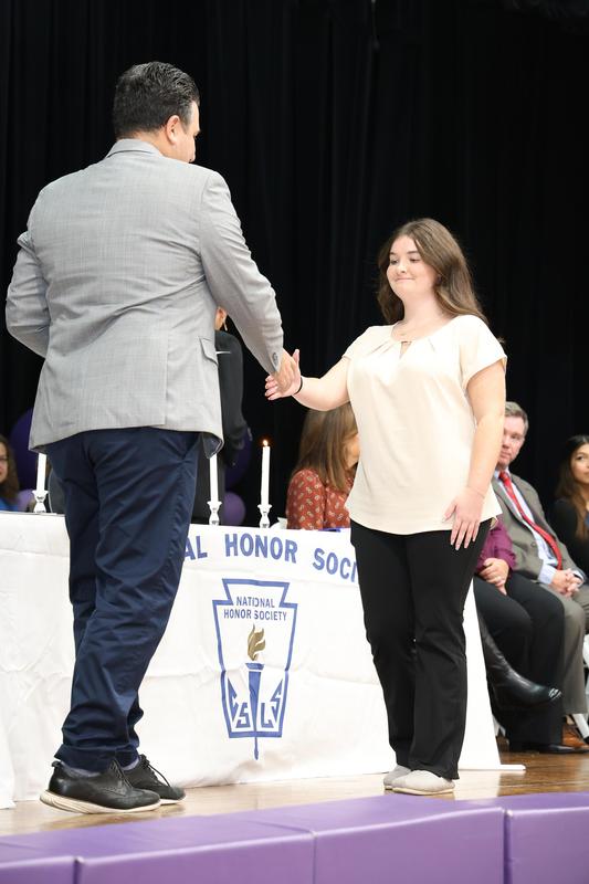 New NHS Members Receive Certificates from Mr. Romano
