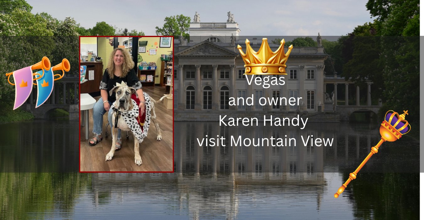 A woman and a dog in a crown-themed setting near a large building.