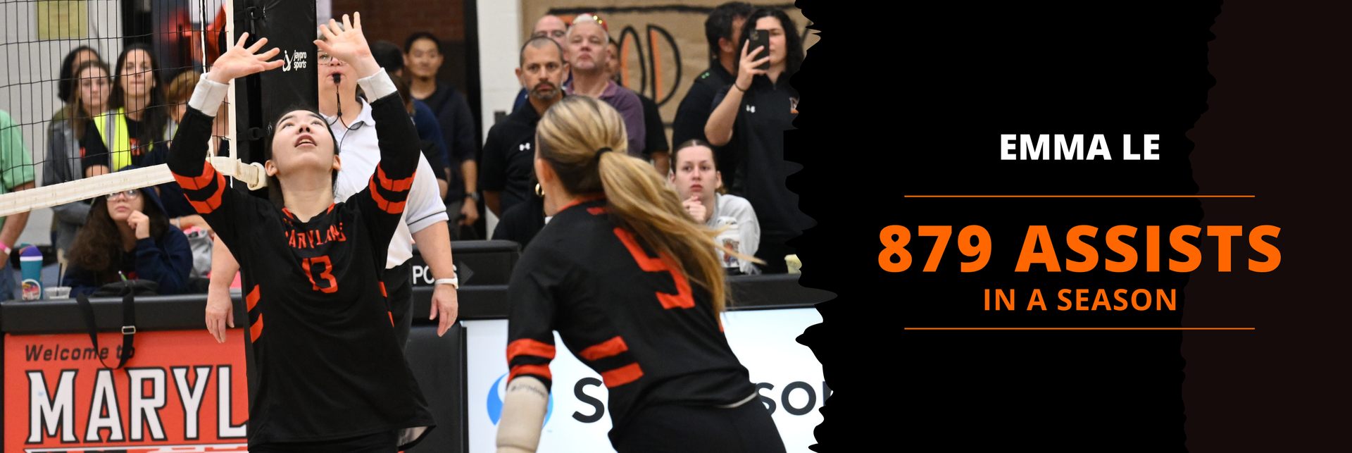 Emma Le sets the ball during a volleyball match, with text on the graphic reading “Emma Le – 879 assists in a season..