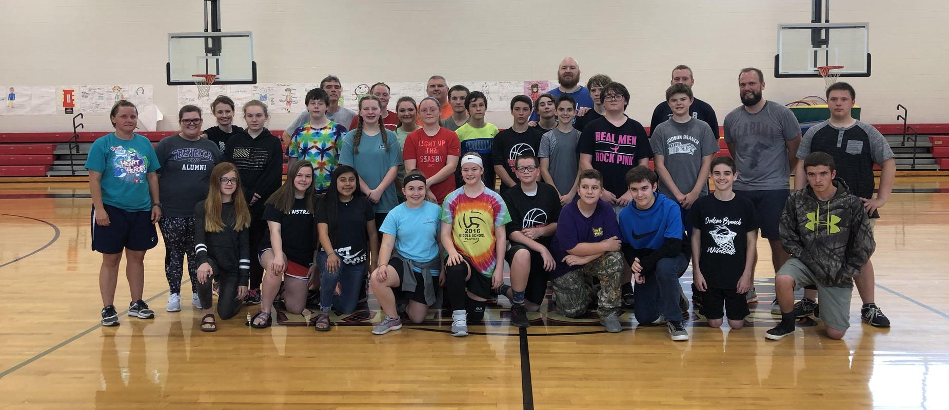 group picture for 8th grade vs teachers basketball game