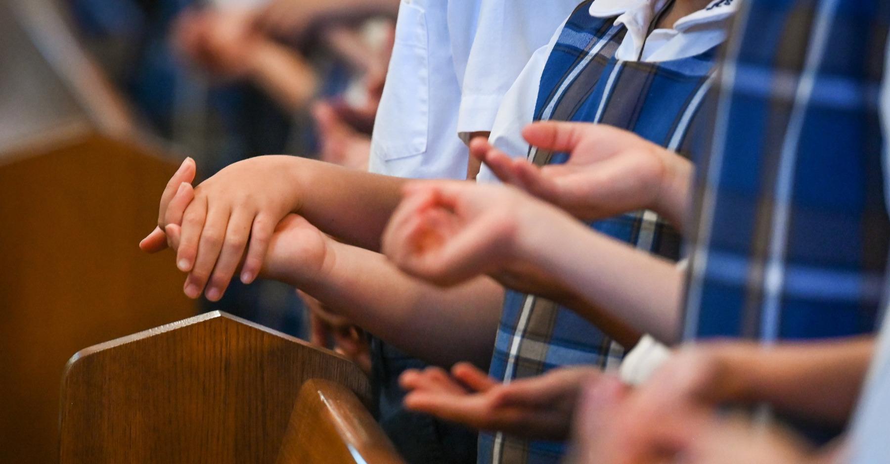 Hands at Mass