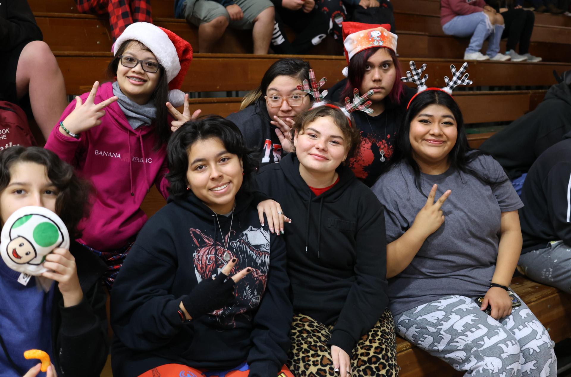 students and staff posing at the winter wishes rally