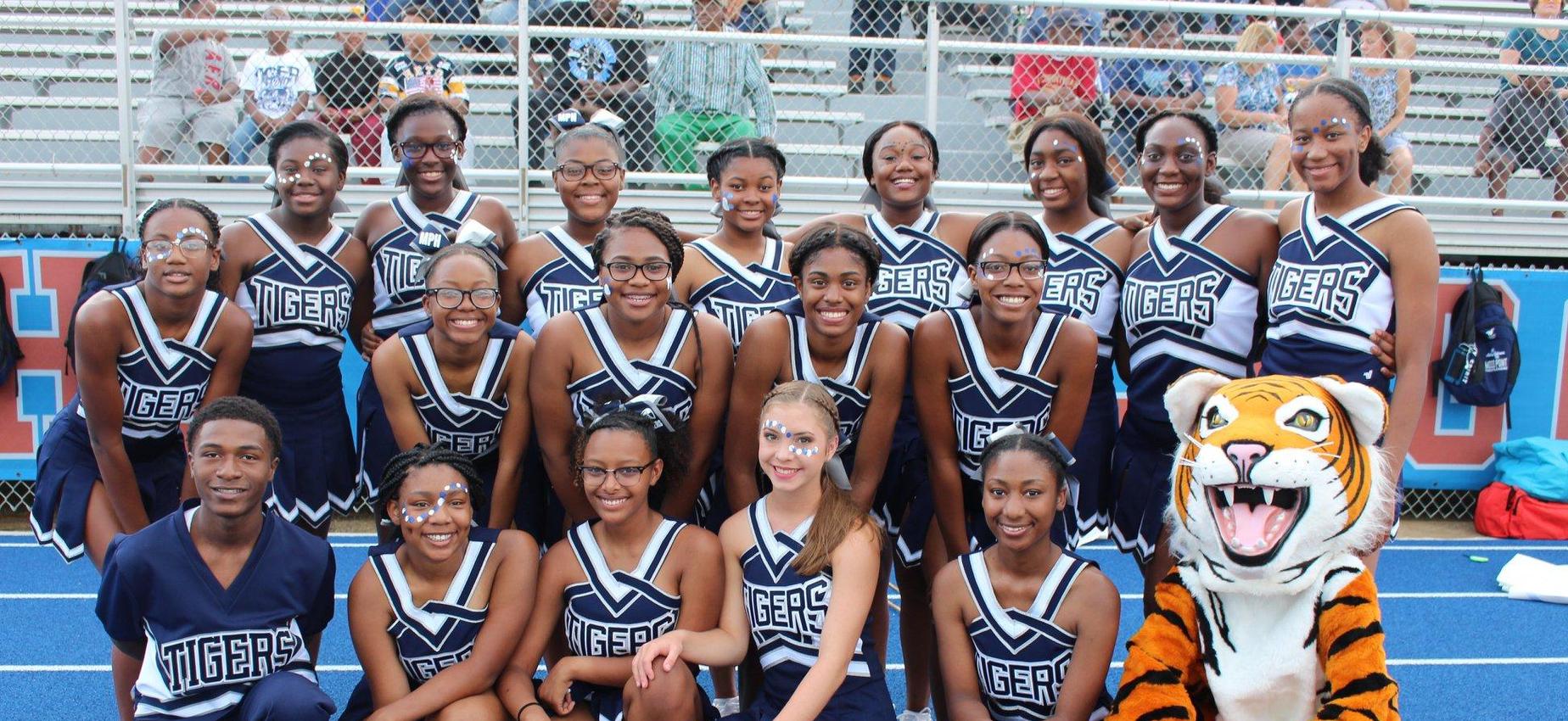 cheerleading squad and mascot
