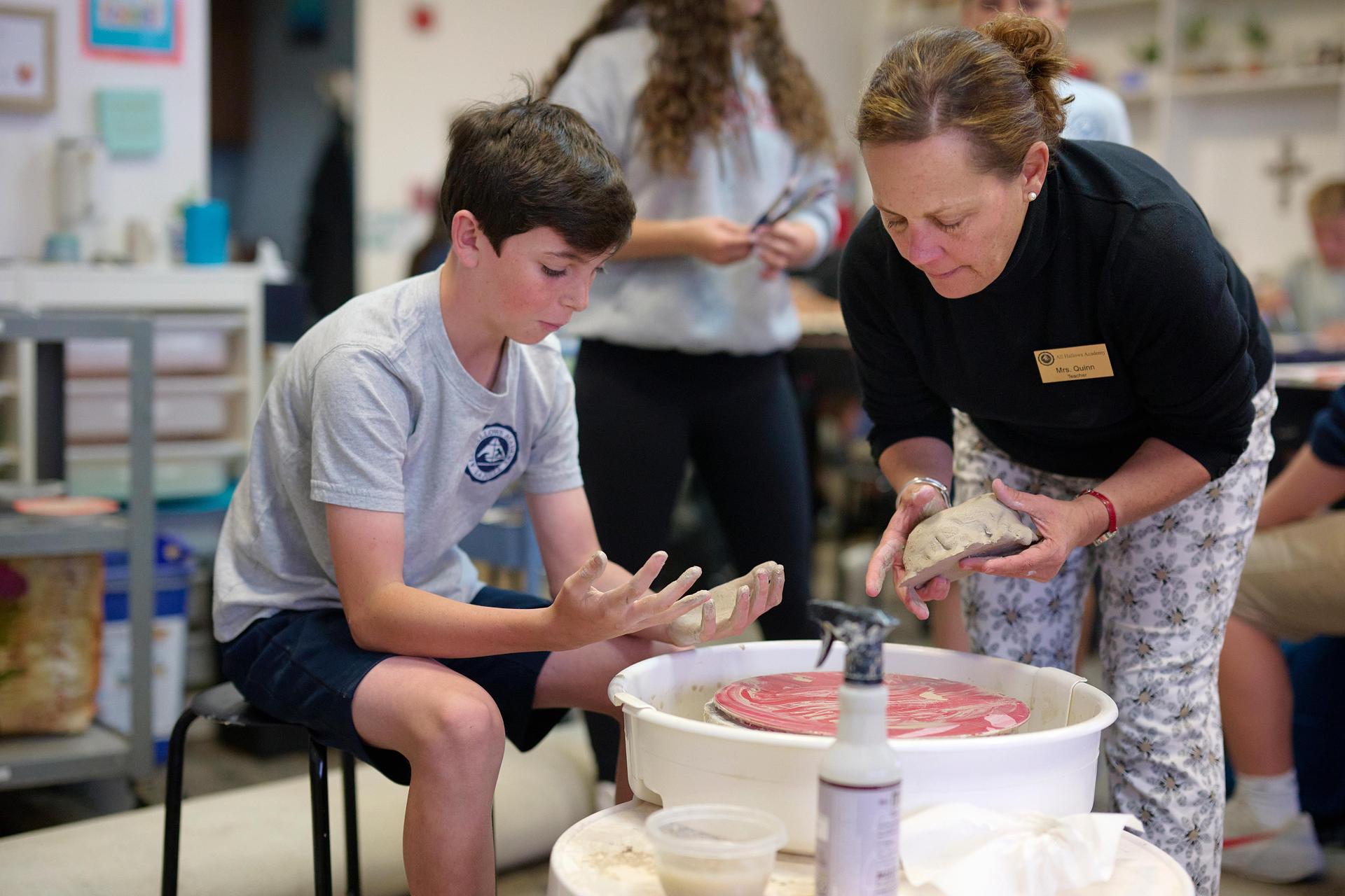 student in ceramics class