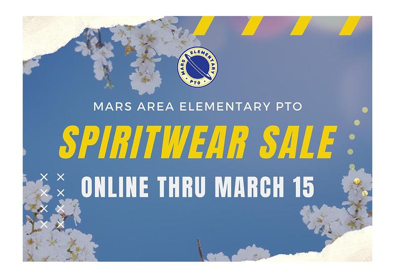 A blue sky background with flowering tree branches