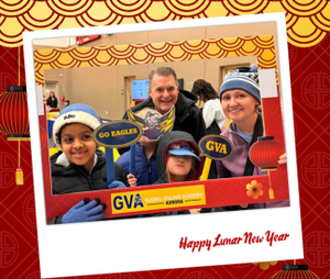 Community members at Global Village Academy Aurora Lunar New Year event photo booth
