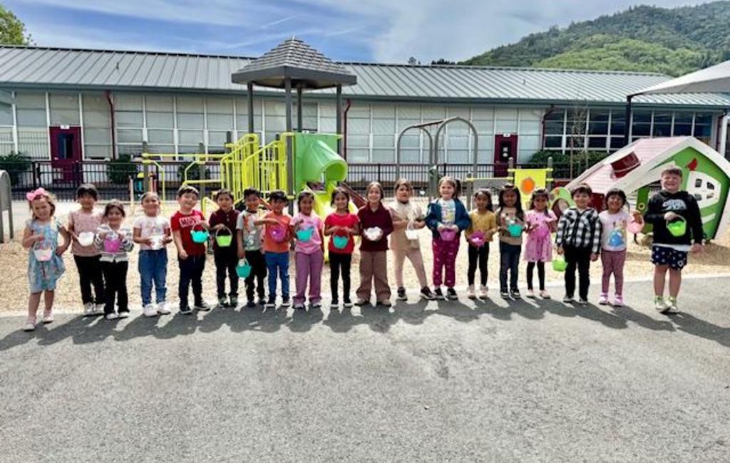 Students holding an Easter basket