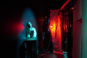 Haunted House Scare Actor posing on set for a photo