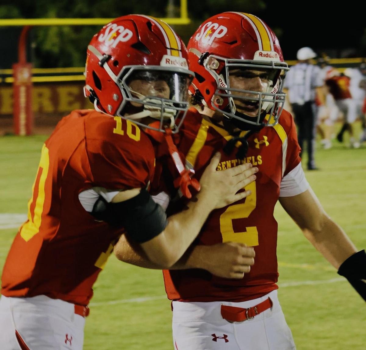 Football players watching intently