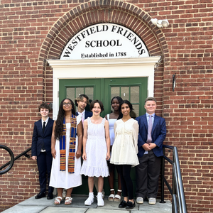 2026 graduation on steps.png