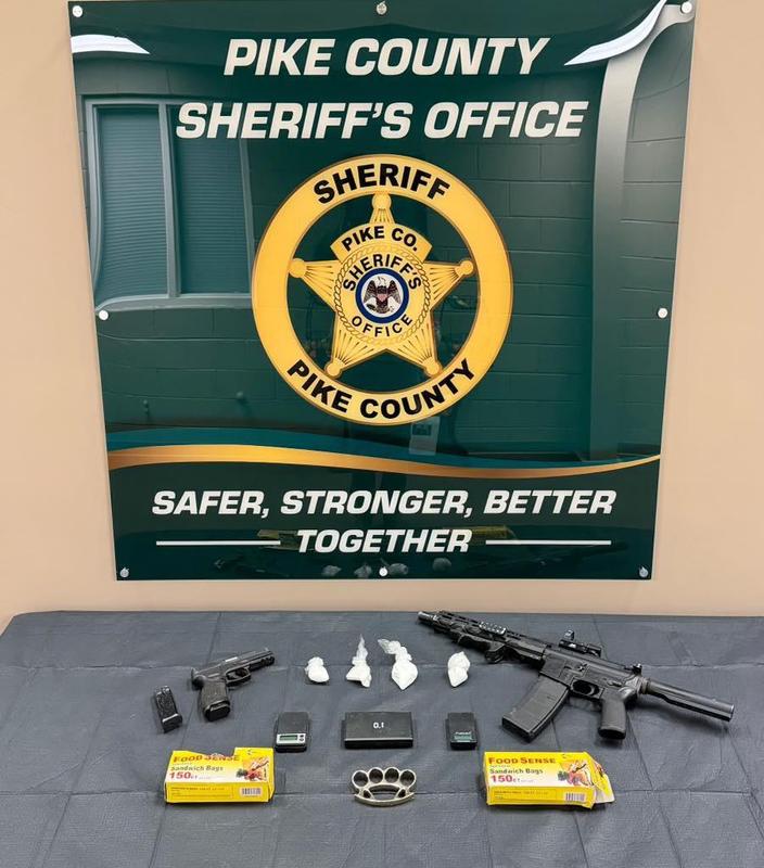 Search Warrant Leads to Drugs and Guns.